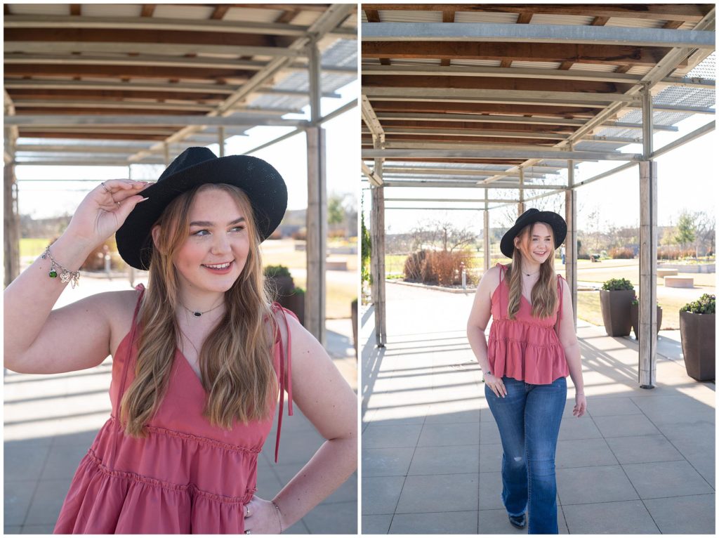 College Station, Texas senior's high school graduation photos. She's wearing a pink top, jeans, black boots, and a black cowboy hat.