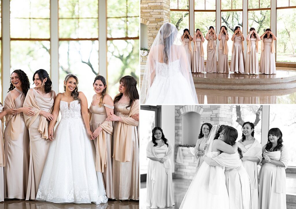 Bride revealing her dress to the bridesmaids in a chapel with large windows behind them