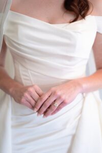 Detail Shot of Bride's Engagement ring on her ring finger.